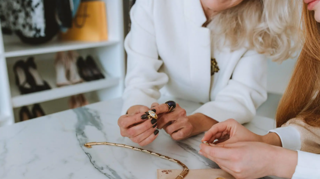 Woman suggesting a piece of jewelry, representing a jewelry designer business for women