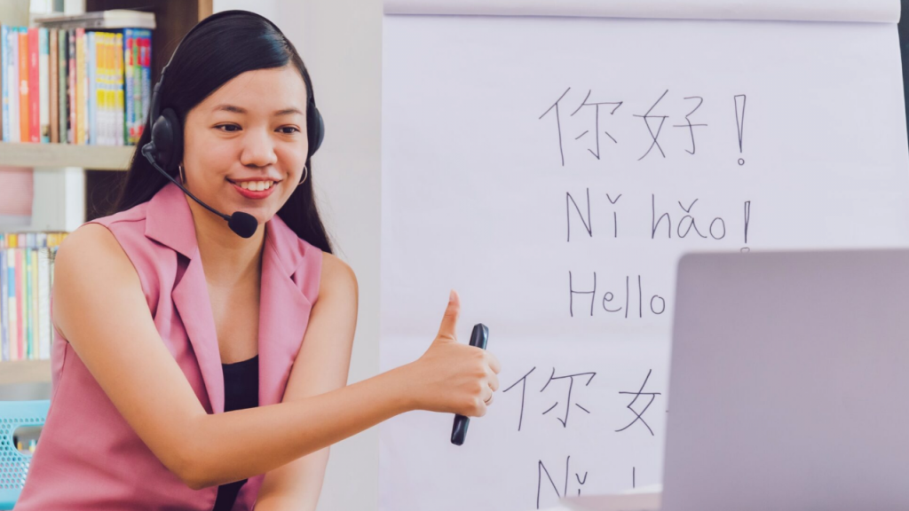 Women teaching online with the laptop representing online teaching business for women