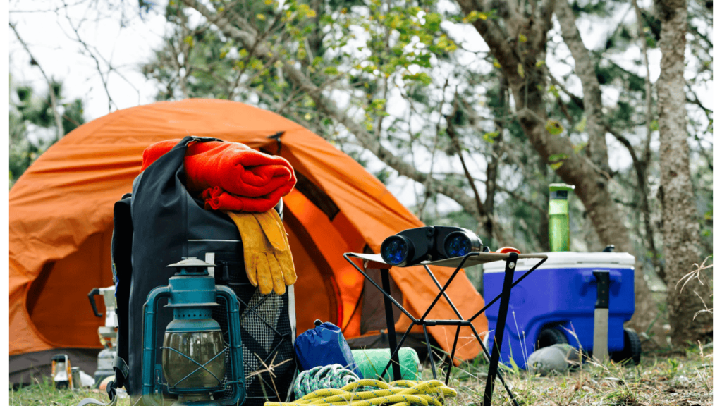 Wholesale camping equipment, including tents, sleeping bags, and portable stoves, ready for outdoor adventures